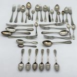 A set of six hallmarked silver tea spoons along with silver plated cutlery