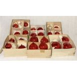 A collection of vintage red glass Christmas decorations bought from Harrods mainly made in West