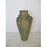 A large terracotta garden urn.