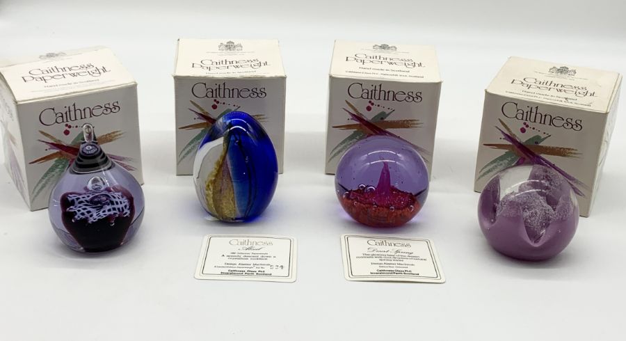 Four boxed Caithness paperweights
