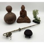 A collection of Eastern items including terracotta Buddha, Gourd etc.