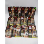 A collection of boxed Hasbro Star Wars Episode 1 figurines including Qui-Gon Jinn, Joda, Queen