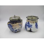 Two Royal Doulton biscuit barrels.