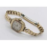 A 9ct gold ladies Avia wristwatch on rolled gold strap