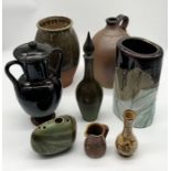 A collection of various studio pottery including John Leach Mulchelney flagon dated 1990, Isles of