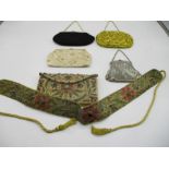 A collection of vintage purses including an embroidered purse with inset cabochon stones with