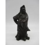 An Oriental bronze figure of an Immortal/Deity, height 16cm.