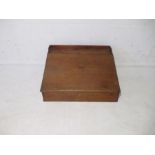 An antique pine table top writing slope, length 63cm.