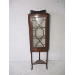 An Edwardian inlaid mahogany corner display cabinet, in need of attention. Height 160cm.