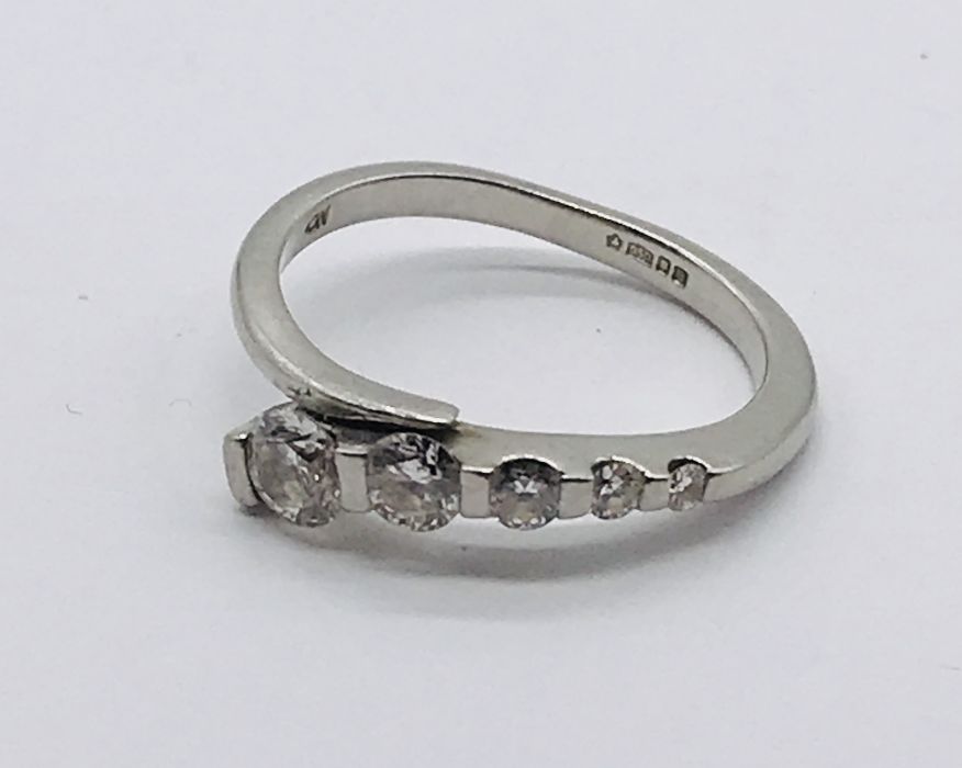 A platinum (950) diamond five stone ring set with graduated stones. Total weight 4.1g. - Image 2 of 2