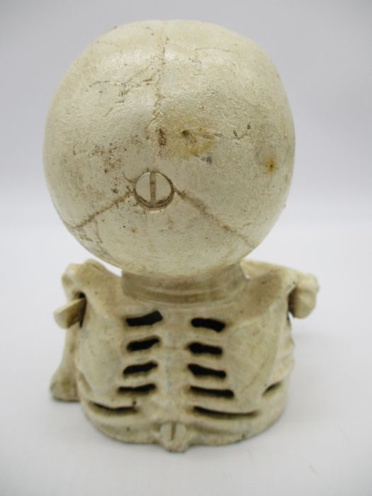 A cast iron money box in the form of a skeleton - Image 3 of 6