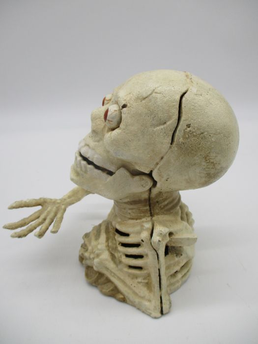 A cast iron money box in the form of a skeleton - Image 2 of 6