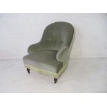 A Victorian button back nursing chair, CVS stamped to leg