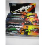 Three Kenner Star Wars lightsabers including two Luke Skywalkers and One Darth Vader plus a