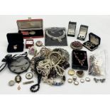 A collection of costume jewellery, Somerset Fire Brigade medal etc.