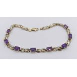 A 9ct gold bracelet set with amethysts and diamonds, weight 3.7g