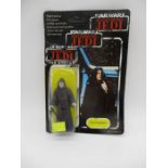 A Palitoy Star Wars Return Of The Jedi "The Emperor" figurine in original packing with trilogo.