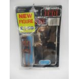 A Palitoy Star Wars Return Of The Jedi "EV-9D9" figurine in original packing with trilogo