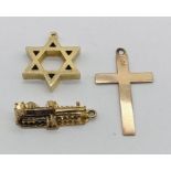 A 9ct gold charm of Christchurch Priory, Star of David and a cross, total weight 7.4g