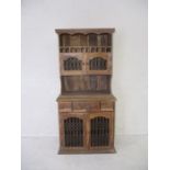 A modern Mexican pine dresser, with four drawers and cupboard below. Height 190cm, length 90cm,