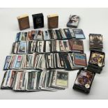 A large collection of Magic the Gathering playing cards including two revised edition starter pack