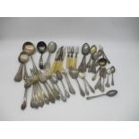 A collection of silver plated cutlery, including some silver collared.