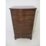 A bow fronted chest of six drawers, height 114cm.