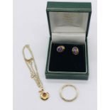 A 9ct gold necklace on chain, scrap 9ct ring and a pair of amethyst earrings set in 9ct gold,