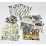 An assortment of football trading cards and photographs including ABC Chart of Football Colours, set