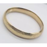 A 9ct gold hinged bangle, weight 12.7g