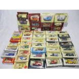 A collection of boxed die-cast vehicles including Lledo Days Gone, Matchbox Models of Yesteryear,