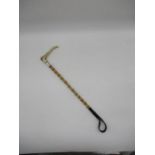 A James Swann & Son, stag horn riding crop, with cane shaft and silver collar, hallmark London