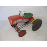 A 1950/1960's child's Tri-ang pedal tractor - barn find