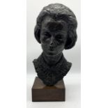 A large bronzed bust of a lady on wooden plinth - height approx 55cm