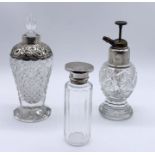 Two silver topped scent bottles - one marked JHW & Son along with one other