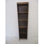 An Oak freestanding narrow bookcase.