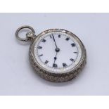 A 925 silver fob watch with white enamelled face and Roman numerals