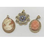 A 9ct gold pendant set with a cameo, one other set with coral and one other