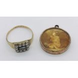 An 18ct gold Georgian mourning ring with seed pearls and lock of hair inset, along with a gold