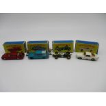 A collection of four boxed Matchbox Series Lesney Product die-cast cars including the Lotus Racing