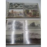 Two albums of vintage postcards of Devon & Cornwall