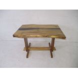 A live edge elm and resin dining table, length 114cm, height 75cm.