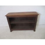 An oak bookshelf, length 107cm, height 72cm.