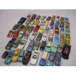 A collection of vintage play worn die-cast vehicles including Dinky Toys, Corgi Toys etc