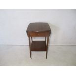 An Edwardian inlaid mahogany drop leaf table with single drawer.