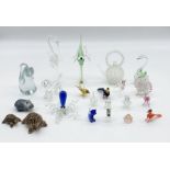 A collection of glass animals and others