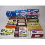 A collection of boxed die-cast model buses including Corgi, Gilbow, Atlas Editions etc, along with a