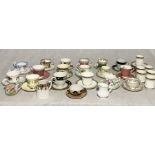 A large collection of teacups and saucers including Royal Albert, Royal Doulton, Paragon etc.