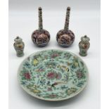 A small collection of Oriental china including two miniature Famille Rose lidded pots, a pair of