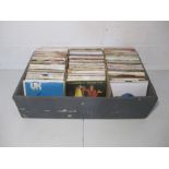 A quantity of 7" vinyl records, including Jefferson Starship, Elton John, Elvis Presley, Diana